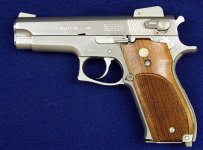 Smith & Wesson Model 639, a stainless steel, 2nd gensingle-stack 9mm.jpg