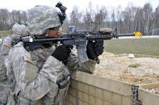 US soldier on live fire range with blank adapter on.jpg