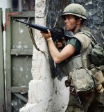 M16 and revolver in Nam.jpg
