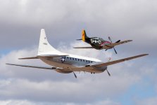 Convair C-131D Samaritan flies formation with a North American P-51D, Luke AFB 2005 x.jpg