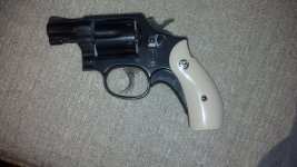 Model 10-7 with new bonded ivory stocks and Pachmayr T type.jpg