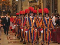 1024px-Group_of_swiss_guards_inside_saint_peter_dome.jpg