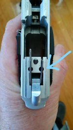 6946 ejector spring hole_Ink_LI.jpg