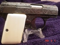 browning 25 baby grips.jpg