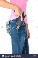 young-girl-model-drawing-pistol-from-hip-holster-DTPER3.jpg