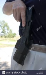 glock-model-22-40-caliber-in-paddle-type-holster-female-plainsclothes-A18WEG.jpg