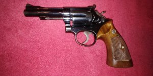 DA)Smith pre model 15 K38 combat masterpiece 4INch 38 special ser#K 329658 circa 1958.jpg