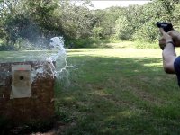 Federal 000 Buck vs Water Jug.jpg