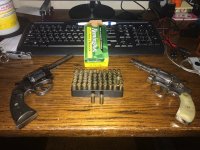 32 long bullets and guns.jpg