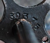 sn on back of extractor star.JPG