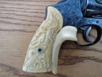 Reg .357 Ivory Grips on Wood.jpg