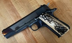 Colt 1911 Handgun Sambar Left 02.jpg