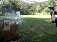 Federal 000 Buck vs Water 2 Jug.jpg