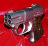 COP 357 multiple barrel firearm handgun pistol.jpg