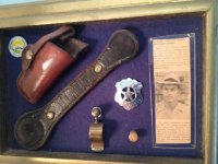 Ed Parker badge and holster.jpg