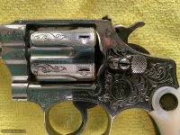 Smith-and-Wesson-Engraved-32-Long-Hand-Ejector-Model-of-1903_102678621_194858_36EDEFADB431EA6F1.jpg