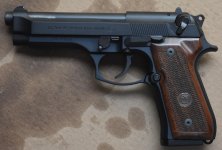 Berettas on greasy cardboard 002.jpg