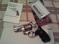 gun witn papers (640x478).jpg