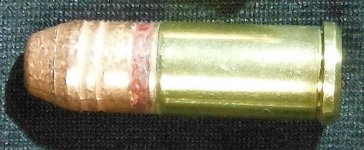 45 auto rim with 300 gr cast crimped with 45LC seater shortened 0.3 in 8-5-2012.jpg