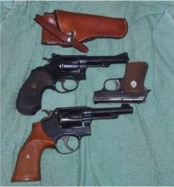 Jr 25, S&W Kit Gun 22 & Victory 38.jpg