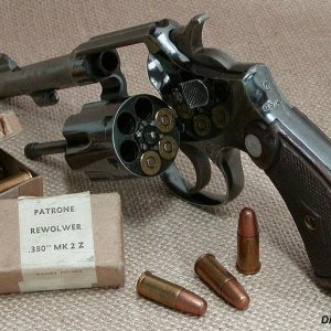 S/N 707445 - S&W .38/200 British Service Revolver with 4" barrel - backstrap stamped with So. Africa Union Defence Force # 6542 and Broad Arrow; plus 