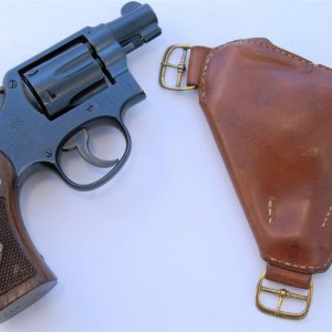 2" M&P with a Berns-Martin Triple Draw Lightnin' holster.The revolver is from the Gary Garbrecht collection.