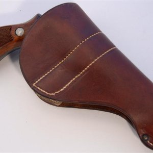 6" M&P revolver with a Heiser model 476 spring belt holster