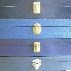 Pre-29 and Model 29 presentation case clasp styles.  From top to bottom:  Pre-29 Four inch, Pre-29 Five screw early 6 1/2 inch, Pre-29 6 1/2 inch and 