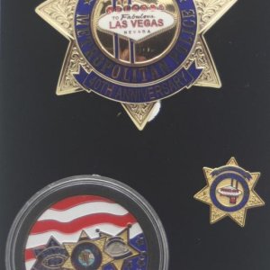 40th anniversary set for the merger of Las Vegas PD and Clark CO S.O. The set includes badge, challenge coin and lapel pin. Crafted by Sun Badge Co.