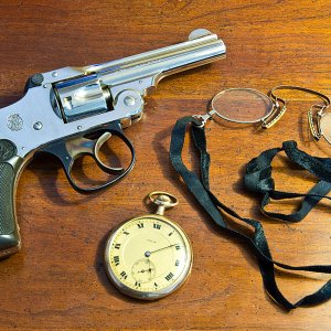 Some relics from a time gone by.  A S&W .32  Safety Hammerless 3rd model from 1921, together with some artifacts from the old mining town of Bisbee, A