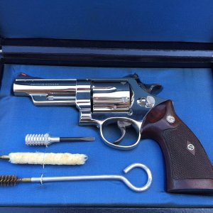 Four screw Model 29 with a four inch barrel and factory nickel finish. Shipped in February of 1959.