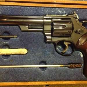 Three screw Model 29-1 with bright blue finish and 6 1/2 inch barrel in the clamshell presentation case.
