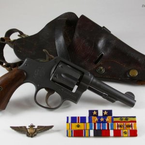 S&W Victory revolver & holster, carried by highly decorated WWII US Navy Pilot.