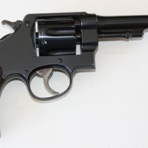 1917 Army 45 ACP serial 7973 with grooved hammer and grips with concave tops