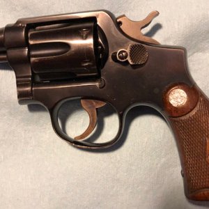 Post war 2 inch M&P with pre war grips that number to the gun shipped in March 1949.