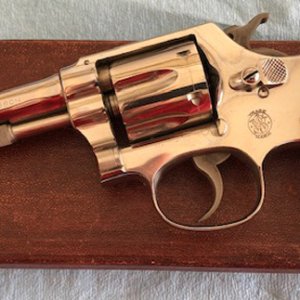 3rd model 32 S&W hand ejector shipped 1940. The grips are from Keith Brown.