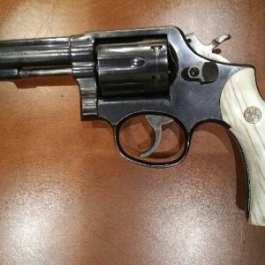 S&W Model 10 .357 Magnum with elk stocks by bgmntmn