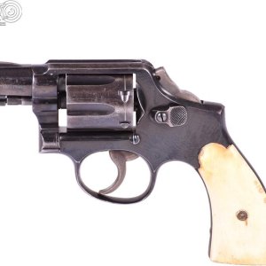 10-5 hammer bobbed, front sight filed down, ivory.  the ivory is why i purchased it. appears to have been thrown from a moving vehicle