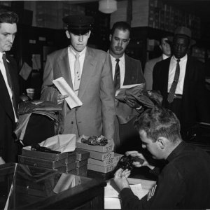 Getting your piece on Day One at the Equipment Bureau. Note the ledger book in which the info is recorded; I have copies of that and all the other boo
