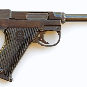 The Swedish M40 Lahti 9mm pistol was specifically designed to work well in cold weather.  The Lahtis were innovative and classic pistols that have bee
