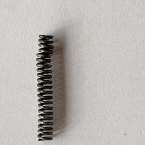 Hand return spring out of trigger