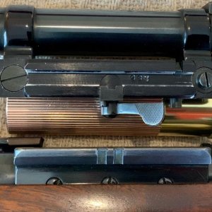 Jaeger sliding dovetail quick release scope mount.