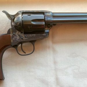 Taylor’s Uberti Gunfighter (right)