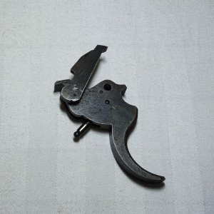 rod connecting trigger to rebound slide