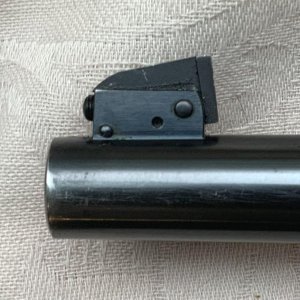 King front sight on Colt Shooting Master 357 (left)