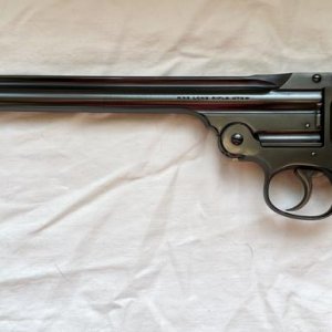 S&W Third Model Perfected Single Shot .22 (left)