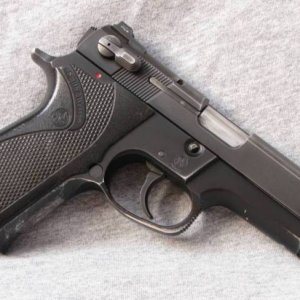 Well used round (4th) trigger guard 5904 with the drawbar and hammer from a 5924, s/n TFS05xx