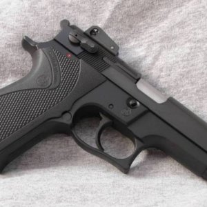 5904 chambered in 9x21mm with 2nd gen slide and separate barrel bushing, s/n TEH69xx