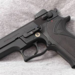 5904 chambered in 9x21mm with 2nd gen slide and separate barrel bushing, s/n TEH69xx