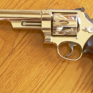 Model 29, four screw, 6 1/2 inch barrel with Rosewood Coke stocks, shipped July 16, 1959.